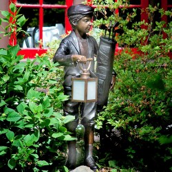 Bronze Golf Caddie Lantern Sculpture - Outside